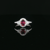 18kt White Gold Oval Ruby & Diamond Halo Ring