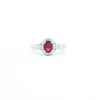 18kt White Gold Oval Ruby & Diamond Halo Ring