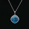 14kt White Gold Aquamarine & Diamond Halo Pendant