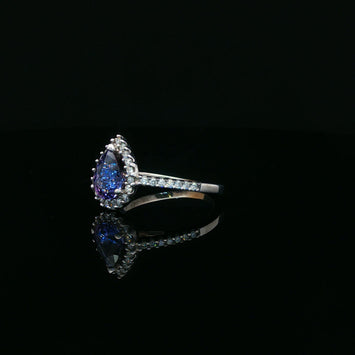 14kt White Gold Pear Shaped Tanzanite & Diamond Halo Ring