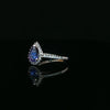 14kt White Gold Pear Shaped Tanzanite & Diamond Halo Ring