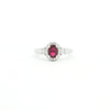18kt White Gold Oval Ruby & Diamond Halo Ring