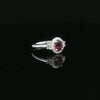 18kt White Gold Oval Ruby & Diamond Halo Ring