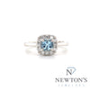 14kt White Gold Aquamarine Fashion Ring with Diamond Halo