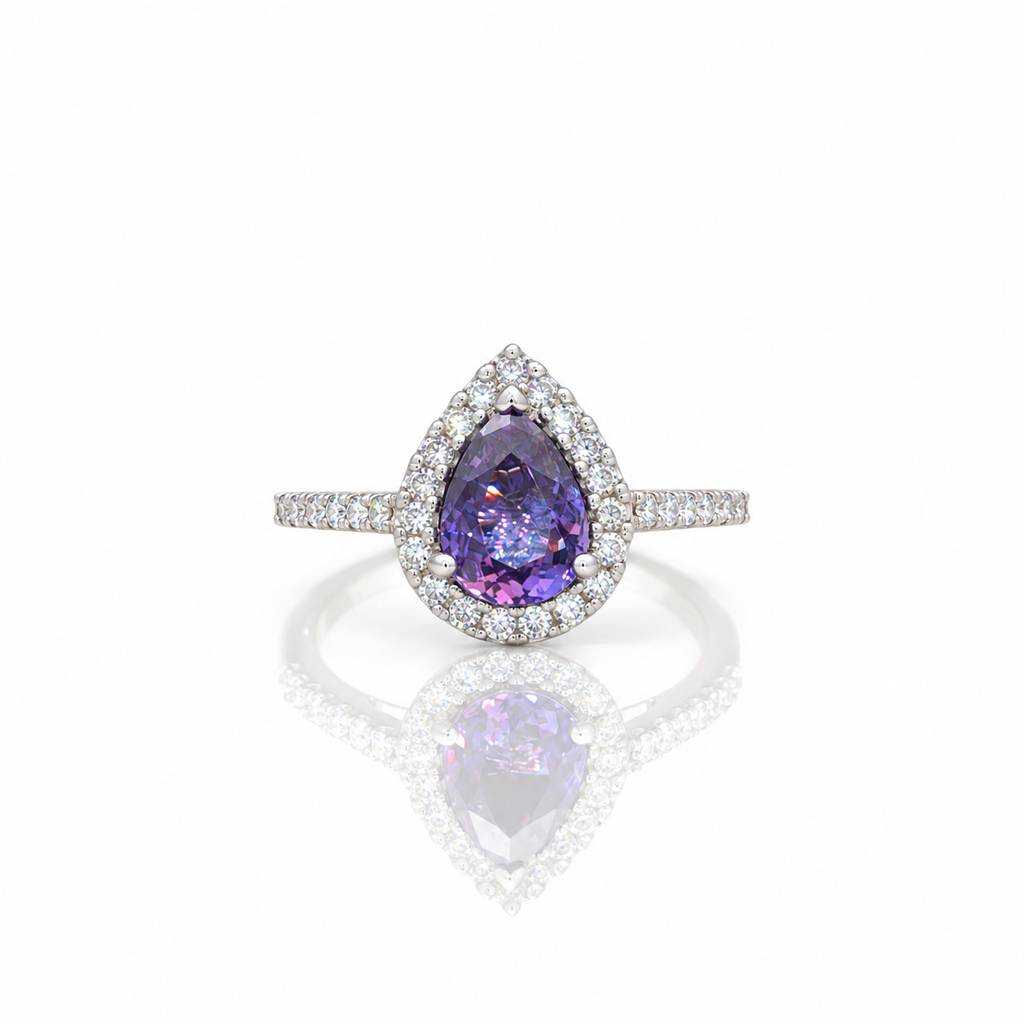 14kt White Gold Pear Shaped Tanzanite & Diamond Halo Ring