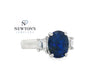 Platinum Oval Sapphire Ring with Baguette Diamond Accents