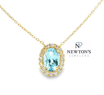 14kt Yellow Gold Oval Blue Topaz and Diamond Halo Pendant