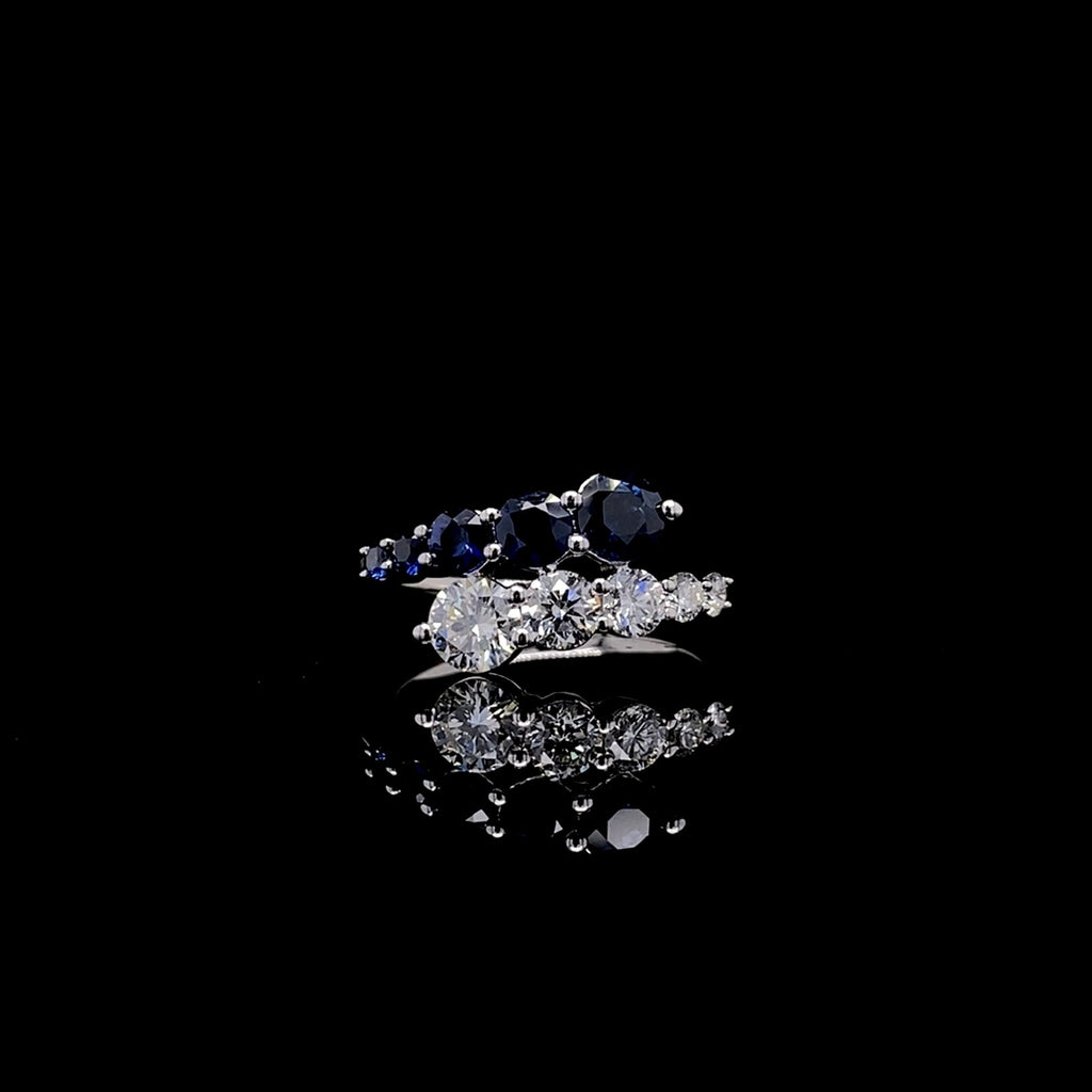 18kt White Gold Graduated Diamond and Sapphire Ring