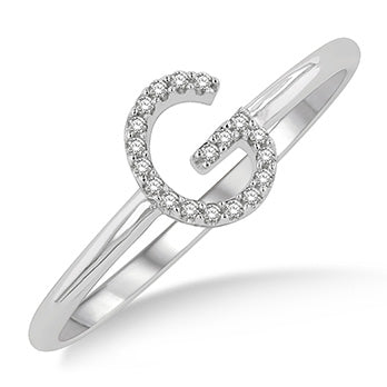 The letter G, in the alphabet set Diamond Ring, is gold and sits on a  faceted diamond set in a 14 karat gold ring Stock Photo - Alamy